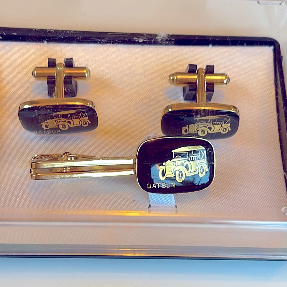 Vintage Datsun cuff links and tie clip